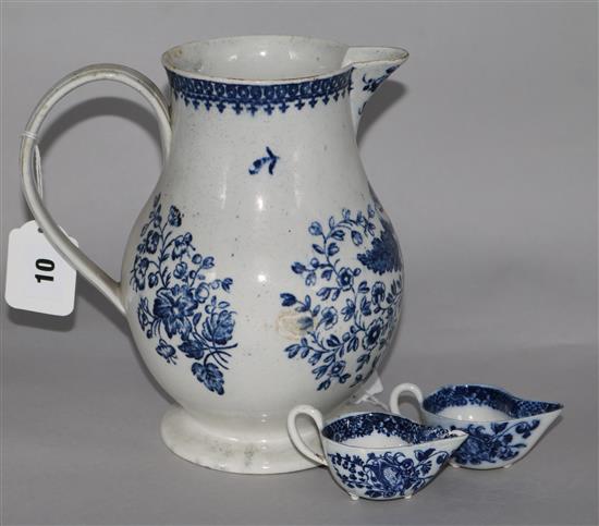 A pair of Liverpool small cream jugs on peg feet (one a.f.), and a blue and white baluster jug, 8.25in. (bruise to one side)
